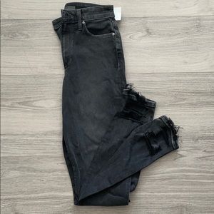 Joe’s ripped black jeans